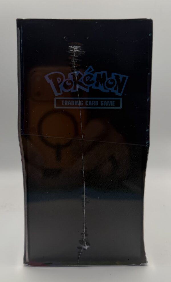 Left side of the sealed Pokémon Phantasmal Flames Elite Trainer Box showing Pokémon logo and shrink wrap seam.